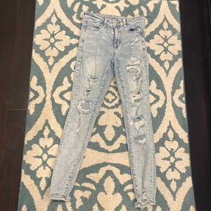 American Eagle light wash ripped  next level stretch jeggings size 4 regular